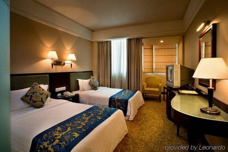 City Hotel Foshan Room photo